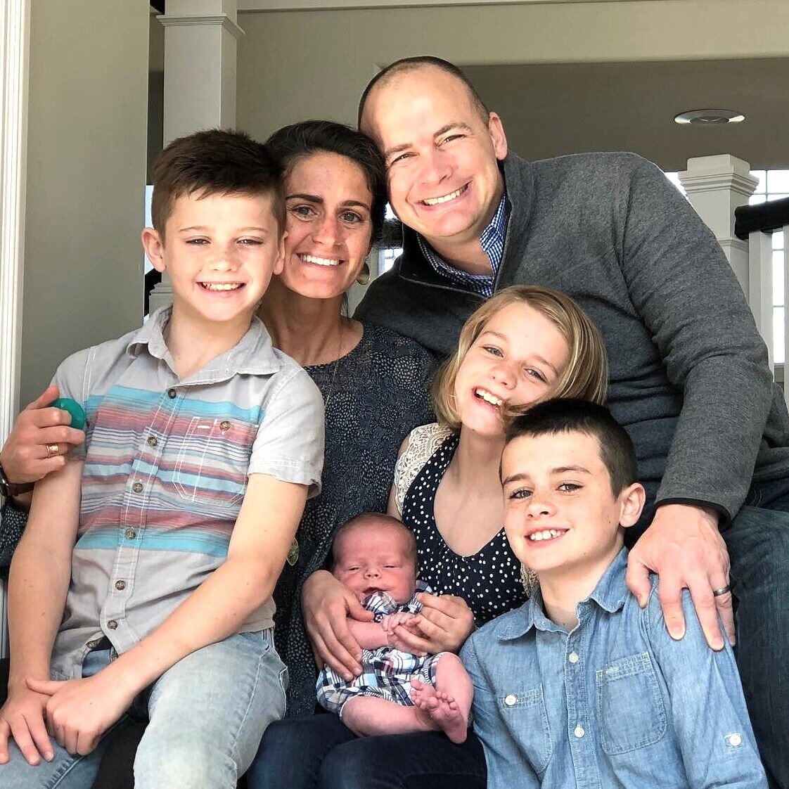 Jeff Brewer with his spouse and four children